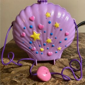 Purple Shell Kids Toy with Stars and Hearts
